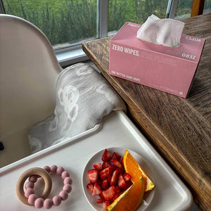 Large Zero Baby Wipes box next to Baby Chair 